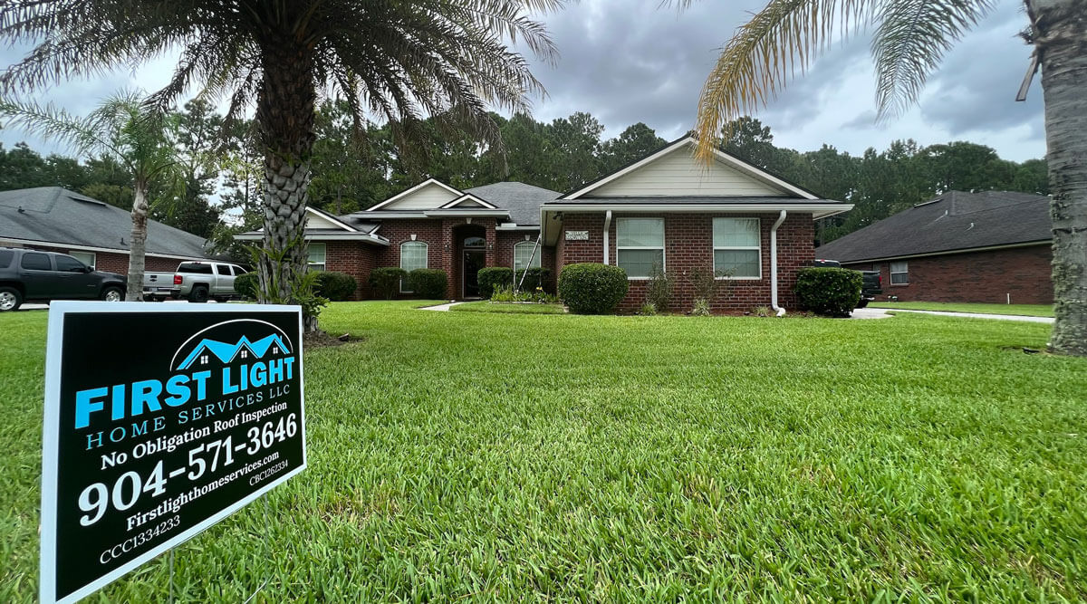 nice residential home with First Light sign in yard