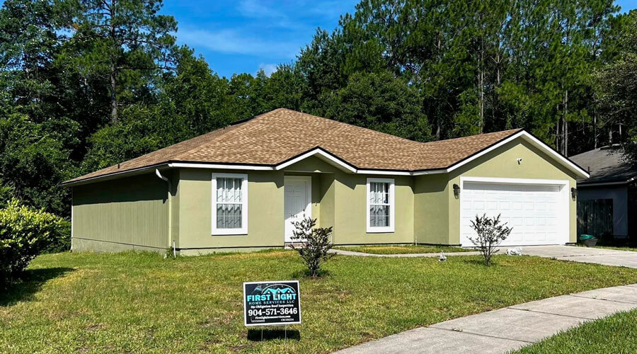 nice residential home with First Light sign in yard