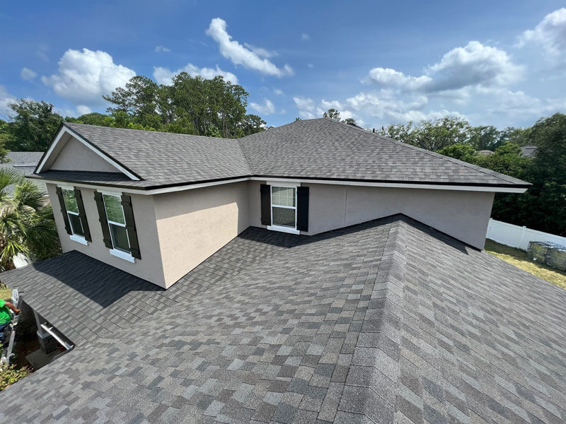 view of roof on top of residential home